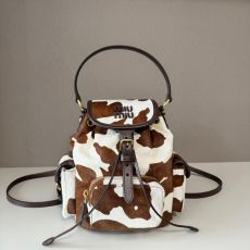 ST64579 MIU MIU cow patterned fur backpack with brown and white retro charm, can be carried by hand or carried on both shoulders 5BZ043
